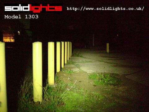 10 Watt 1303 shining on row of yellow poles